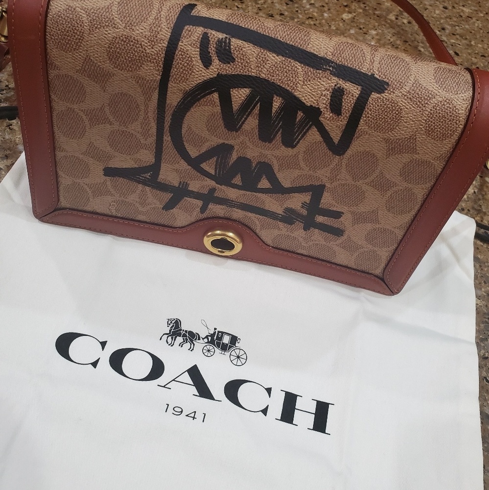 Riley In Signature Canvas With Rexy By Guang Yu